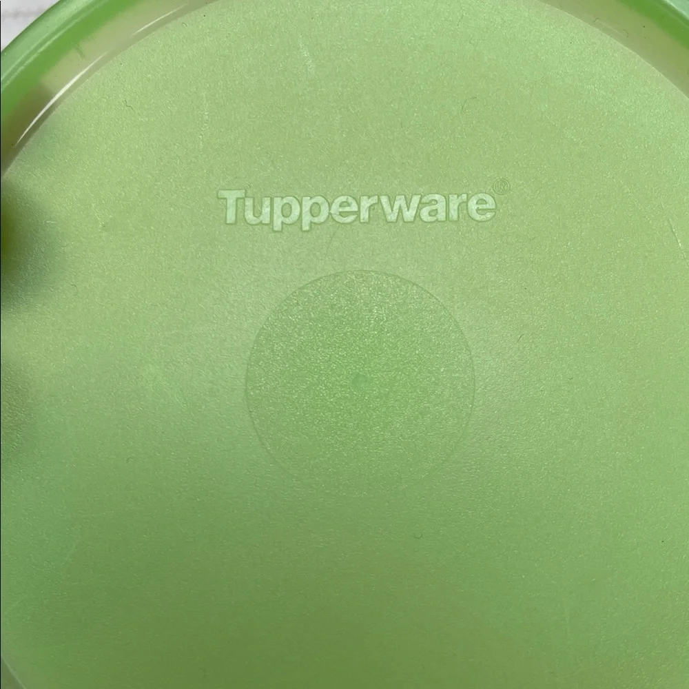 Tupperware storage with light Green Lids. Lot of 2. Round circular
